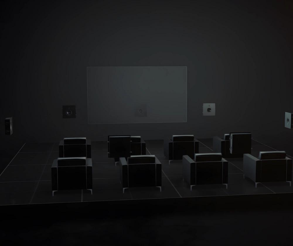 Image of an imaginary cinema room with Lyngdorf D-5 loudspeakers installed as front, centre and side channels